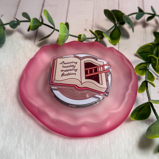 Leaving Reality, Entering Fiction Magnetic Kindle Grip | MagSafe Kindle & Phone Grip