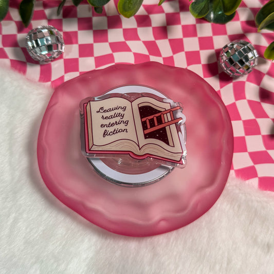 Leaving Reality, Entering Fiction Magnetic Kindle Grip | MagSafe Kindle & Phone Grip